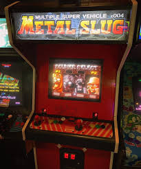 Imagen del juego Metal Slug corriendo e una máquina Arcade.